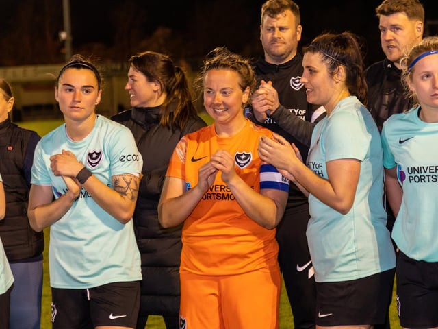 Portsmouth players await being presented with the PDFA Senior Cup. Picture by Alex Shute