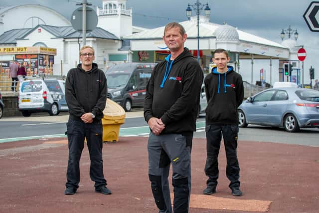 Andy Kircher runs a CCTV business and he has grown over the past year, employing two young apprentices

Pictured: Andy Kircher with his apprentices, Alfie Newsham and Luke Mitchell at South Parade Pier, Southsea on 20 August 2021

Picture: Habibur Rahman