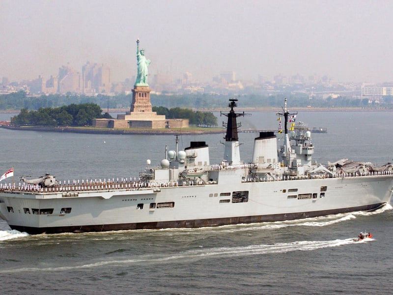 The Royal Navy's HMS Invincible passes the Statue of Liberty Thursday July 1, 2004, at the start of a six day visit to New York. Picture:LA (Phot) Dave Gallagher / HMS Invincible / Crown Copyright.