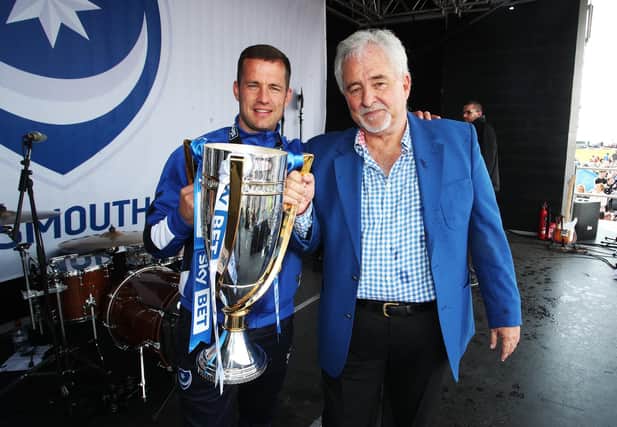 Former Pompey chairman Iain McInnes, right, with ex-skipper Michael Doyle and the League Two trophy
