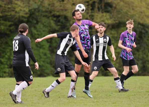 Action from Al's Bar's 3-0 win over Emsworth Town reserves (black and white kit) in City of Portsmouth Sunday Football League Division Four. Picture: Kevin Shipp