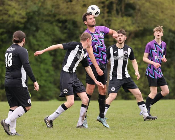 Action from Al's Bar's 3-0 win over Emsworth Town reserves (black and white kit) in City of Portsmouth Sunday Football League Division Four. Picture: Kevin Shipp