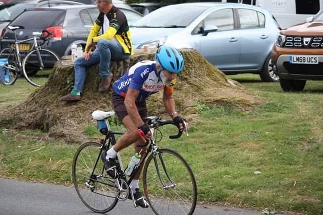 Brian competing in a previous cycling challenge.