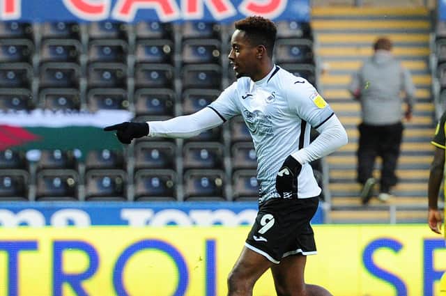 SWANSEA, WALES - JANUARY 02: Jamal Lowe of Swansea City celebrates scoring his side's equalising goal to make the score 1-1 during the Sky Bet Championship match between Swansea City and Watford at the Liberty Stadium on January 02, 2021 in Swansea, Wales. (Photo by Athena Pictures/Getty Images)