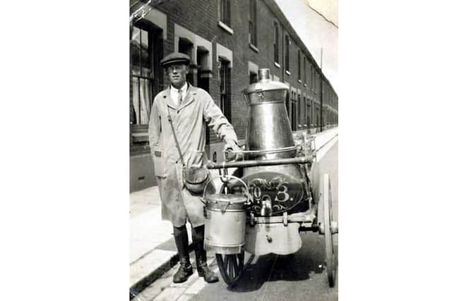 Milkman George Warner somewhere in Portsmouth in the 1920s.