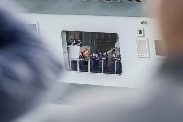Crew members of HMS Queen Elizabeth pictured as families watch them leave from Portsmouth.
Picture: Habibur Rahman