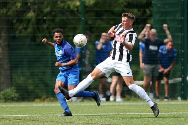 Rudi Blankson, left, in action for Baffins during their surprise pre-season friendly loss to Hayling United at Front Lawn. Picture: Chris Moorhouse