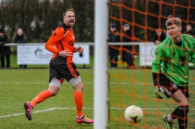 Brett Pitman's smile says it all as he scores his 32nd Wessex League goal of the season. Picture by Daniel Haswell