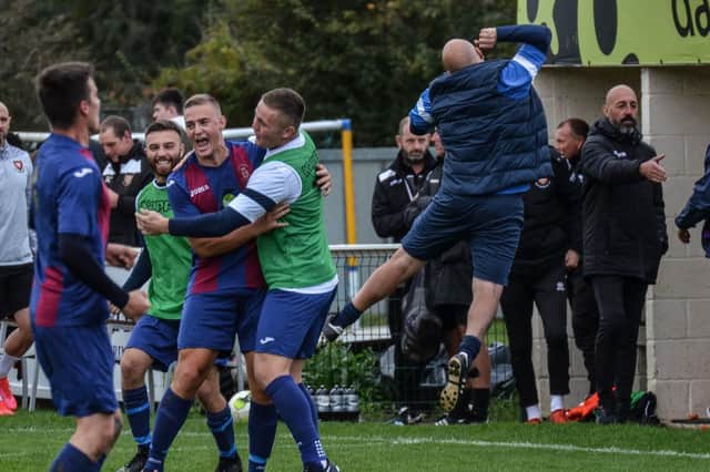 US Portsmouth celebrate their shock FA Vase victory at AFC Portchester earlier this season. Another win against higher division Christchurch this weekend will take them into the last 16 and provide them with their fourth Wessex Premier scalp in five Vase rounds