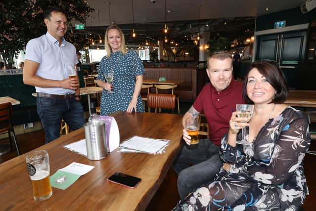 From left, Phil and Jen Sharland, and Steve and Donna Hill. Eden at Gunwharf Quays reopened on 'Super Saturday' following the easing of Covid-19 restrictions
Picture: Chris Moorhouse    (040720-09)
