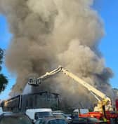 More than 80 firefighters were deployed to tackle a ferocious garage fire, which spread to nearby vehicles and buildings in Southampton. Smoke could be seen filling the sky.