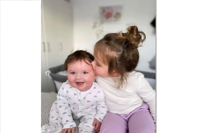 After weeks on life support, Baby Hudson has made a 'miracle' recovery and has returned home to his home in Hilsea. Pictured L to R: Seven-month-old Hudson Doyle, alongside two-year-old sister Pixie.