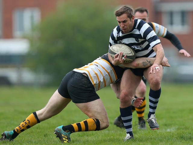Tom Merritt, right, is tackled. Picture: Chris Moorhouse (jpns 220423-038)
