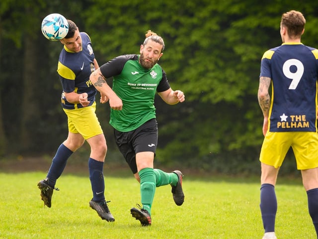 Action from Saturn Royale's 1-0 win over Pelham Arms (blue and yellow kit) in the second Adelaide Cup semi-final. Picture: Keith Woodland (300421-131)