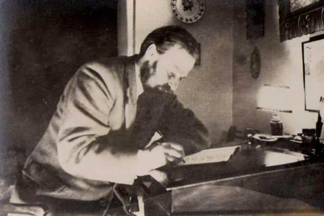 A book about growing up on the Isle of Wight written by Peter Lansley has been published after his son Charles Lansley found the manuscript. Pictured: Peter writing at his desk 