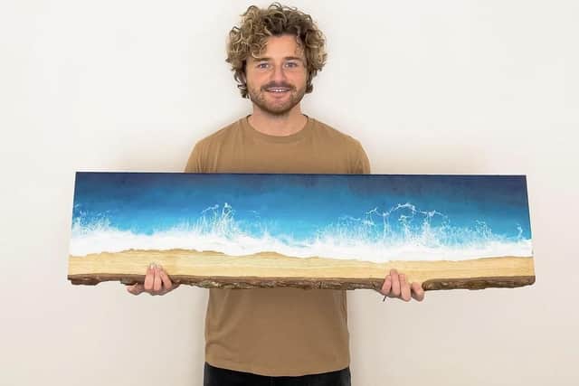 Sam Rogers with one of his resin beaches.