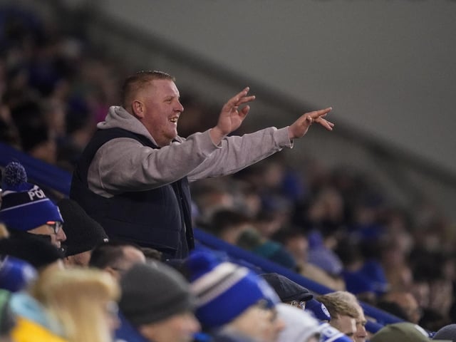 Pompey fans backed their team to a crucial Championship survival win over Cardiff last night.