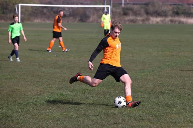 Action from the City of Portsmouth Sunday League Division Five match between AFC Farlington (orange shirts) and AFC Bedhampton Village A (light green shirts). Picture: Sam Stephenson