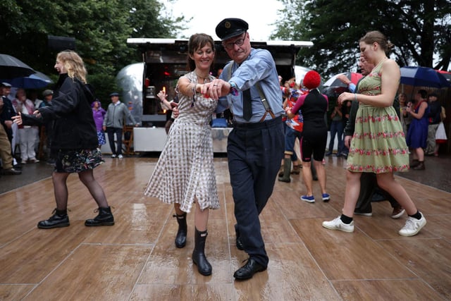 Wet weather just gave attendees the chance to dance in the rain. Photo: Kieran Cleeves/PA Wire