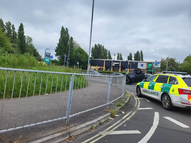 Car flips in Burrfields Road crash
