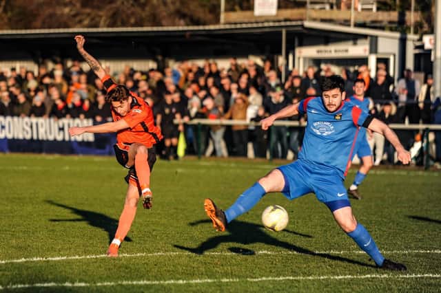 Portchester striker Harrison Brook takes a shot in front of the new Wessex League crowd record of 1,598 against Fareham yesterday. Picture by Daniel Haswell