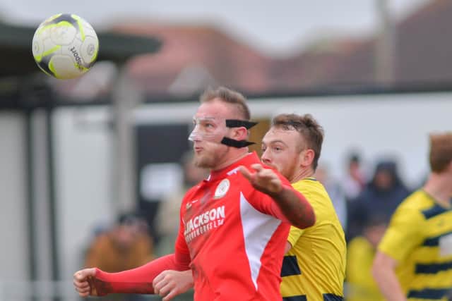 Horndean striker Connor Duffin, wearing a face mask to protect a broken nose, v Hamworthy. Picture: Martyn White