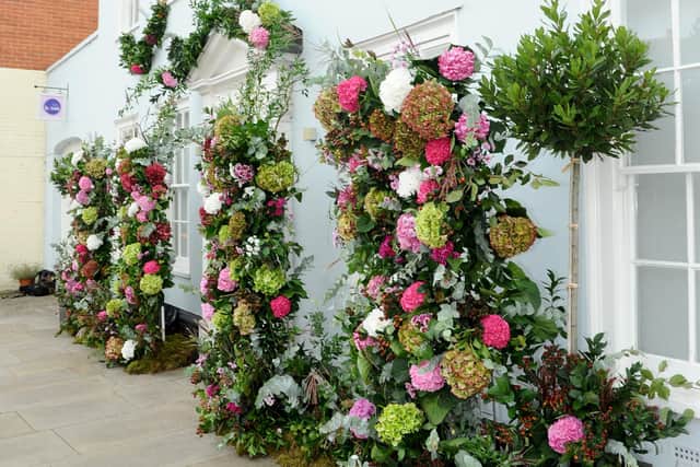 The Breast Cancer Haven, Wessex with a flower wall created by florist Susie Babington 
Picture: Sarah Standing (180726-5308)