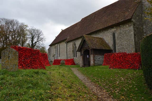 The display of poppies inside and outside St Michael and All Angels Church in the village of Chalton
