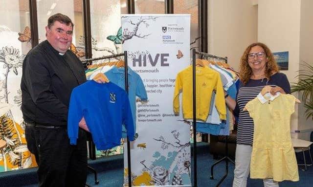 Father Bob White and Cllr Suzy Horton at the new Hive Portsmouth pop up school uniform exchange shop.