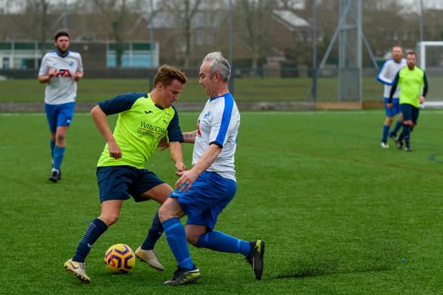 Mitch Austin in action for Harvest Home against West Wight. Picture: Vernon Nash