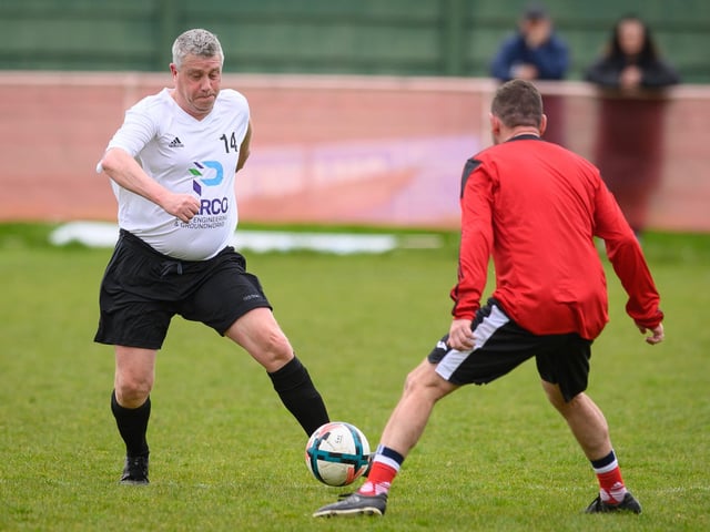 Action from the Jon Gittens memorial charity match between a team of former Fareham Town players and a side of ex-Pompey and Southampton professionals. Picture: Keith Woodland (160421-627)