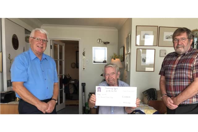 Lee-on-the-Solent resident David Gray has donated £2,000 to help the closed library in the area be turned into Lee Hub. Pictured: Cllr John Beavis, David Gray and Cllr Graham Burgess