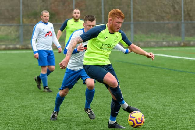 Mitch Frost on the ball for Harvest Home against West Wight. Picture: Vernon Nash