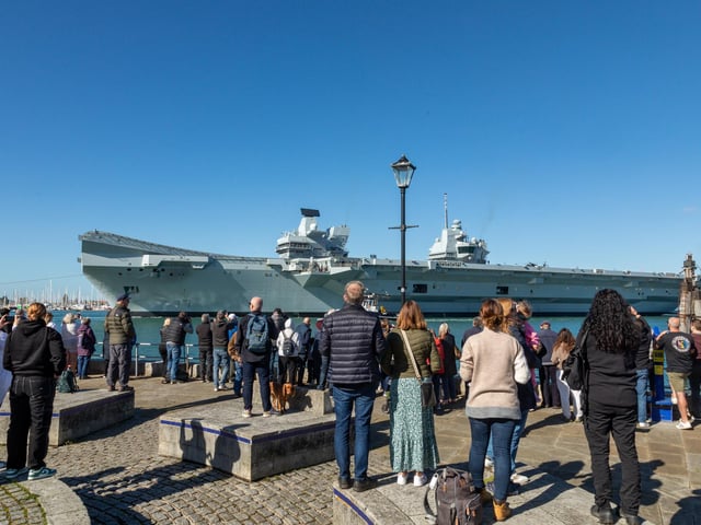 Onlookers at the Point watching HMS Prince Of Wales being deployed. Picture: Mike Cooter (280924)