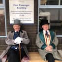 Taking a seat before boarding the ferry - two David Copperfield cast members