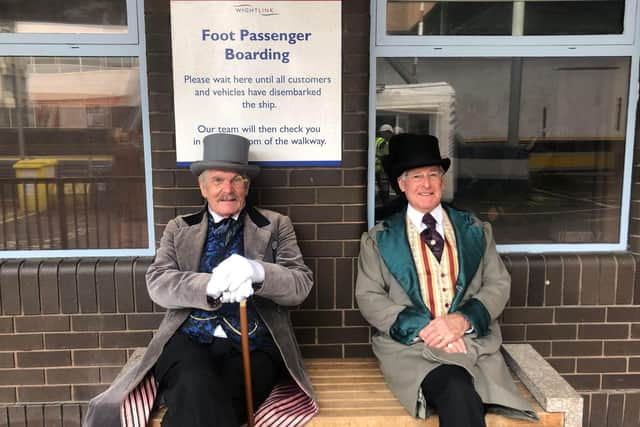 Taking a seat before boarding the ferry - two David Copperfield cast members