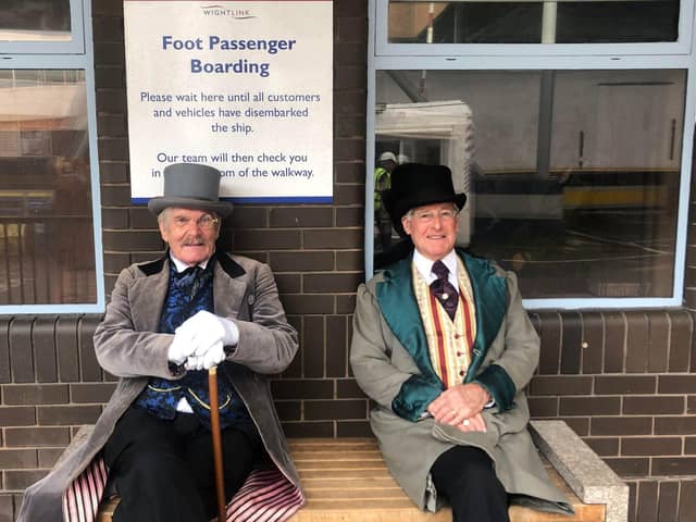 Taking a seat before boarding the ferry - two David Copperfield cast members