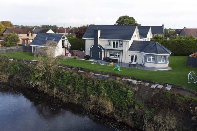 Aerial view of property showing location next to River Carron.