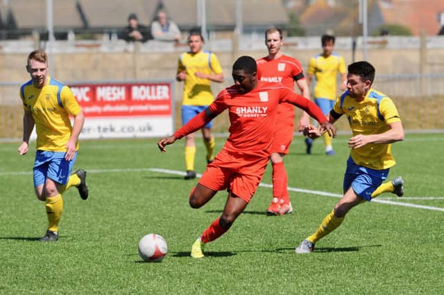 Flackwell Heath (red) in action during their FA Vase 4th rd win at Lancing. Pic:  Stephen Goodger