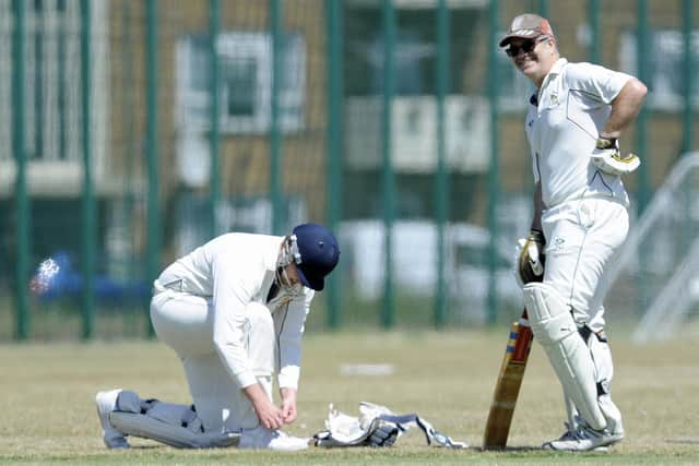 Mark Darby, right, takes a breather during  his unbeaten 131 against Portsmouth Community. Picture Ian Hargreaves