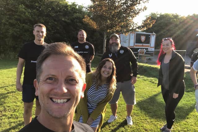 AFC Portchester Veterans pair Pete Sanderson,  left, and Keith Ashton, closest to camera, prior to their 12-hour endurance challenge with Dan Mortimer, third left, Vicky Ashton, fourth left, Lee Jones and Hannah Cronshaw, far right