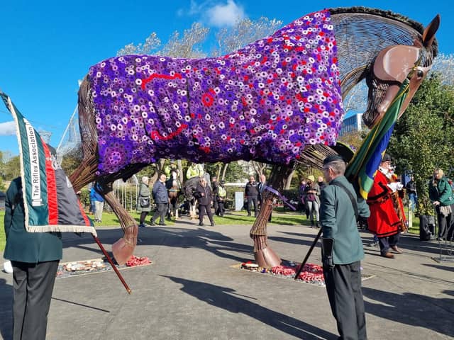 Watch as War Horse memorial gets purple poppy coat to remember fallen service animals