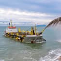The Sospan Dau dredging vessel performing a rainbowing show.
Picture: Michael Woods/SSS Direct Ltd