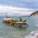 The Sospan Dau dredging vessel performing a rainbowing show.
Picture: Michael Woods/SSS Direct Ltd