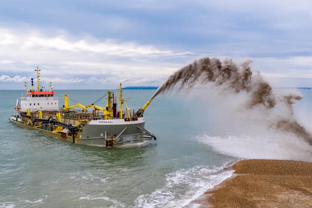 The Sospan Dau dredging vessel performing a rainbowing show.
Picture: Michael Woods/SSS Direct Ltd