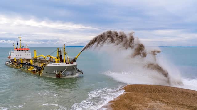 The Sospan Dau dredging vessel performing a rainbowing show.
Picture: Michael Woods/SSS Direct Ltd