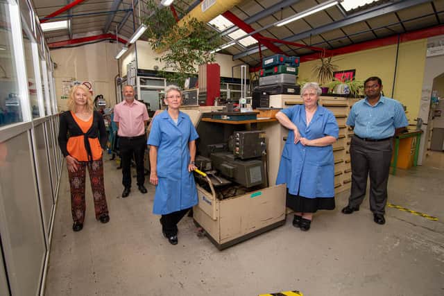 Maggie Gouldin is hanging up her jacket after 36 years with Barnbrook Systems in Fareham.Pictured: Maggie Gouldin with her co workers, Karen Williamson, Andrew Gordon,  Sharon Whettingsteel and Vignesh Gunasekaren at Barnbrook Systems, Fareham on 17 June 2021Picture: Habibur Rahman