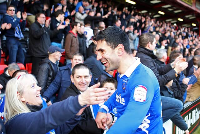 Ricardo Rocha celebrates with a fan at the final whistle. Picture: Joe Pepler