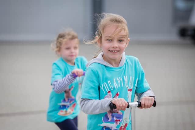 A group of six 7-year-olds from Cumberland Infant School have taken on a sponsored scoot for Sport Relief and are at their finishing point at INEOS Team UK HQ in Old Portsmouth on 13 Friday March 2020.Pictured: Anabelle Day 7 taking the lead.Picture: Habibur Rahman (130320-14)