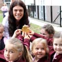 Lauren Steadman with her gold medal and pupils from the prep school